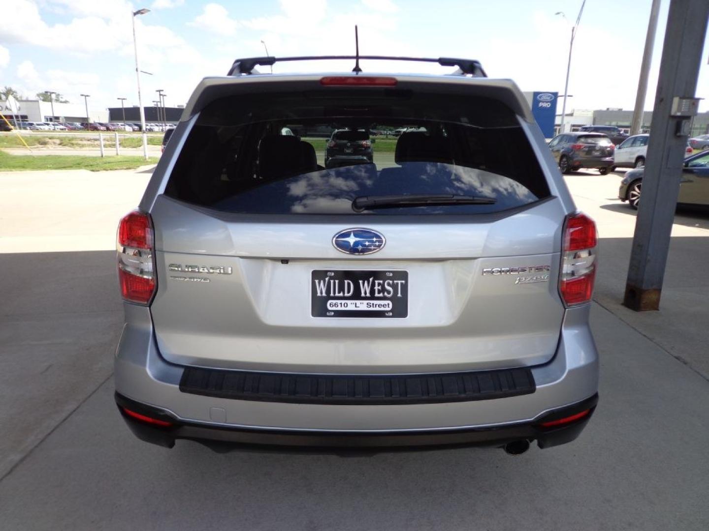 2014 SILVER SUBARU FORESTER 2.5I LIMITED (JF2SJAHC2EH) with an 2.5L engine, Continuously Variable transmission, located at 6610 L St., Omaha, NE, 68117, (402) 731-7800, 41.212872, -96.014702 - THIS VEHICLE HAS A BEEN FULLY INSPECTED AND HAS A CLEAN TITLE WITH A FREE CARFAX REPORT PROVIDED! 2-OWNER, CLEAN CARFAX, LOW MILEAGE, HEATED LEATHER, SUNROOF, AND NEWER TIRES! *****We have found that most customers do the majority of their shopping online before visiting a ealership. For this r- Photo#4