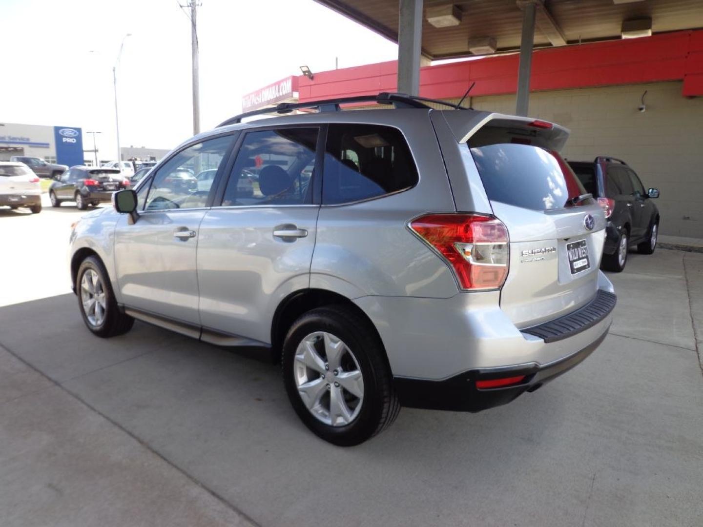 2014 SILVER SUBARU FORESTER 2.5I LIMITED (JF2SJAHC2EH) with an 2.5L engine, Continuously Variable transmission, located at 6610 L St., Omaha, NE, 68117, (402) 731-7800, 41.212872, -96.014702 - THIS VEHICLE HAS A BEEN FULLY INSPECTED AND HAS A CLEAN TITLE WITH A FREE CARFAX REPORT PROVIDED! 2-OWNER, CLEAN CARFAX, LOW MILEAGE, HEATED LEATHER, SUNROOF, AND NEWER TIRES! *****We have found that most customers do the majority of their shopping online before visiting a ealership. For this r- Photo#5