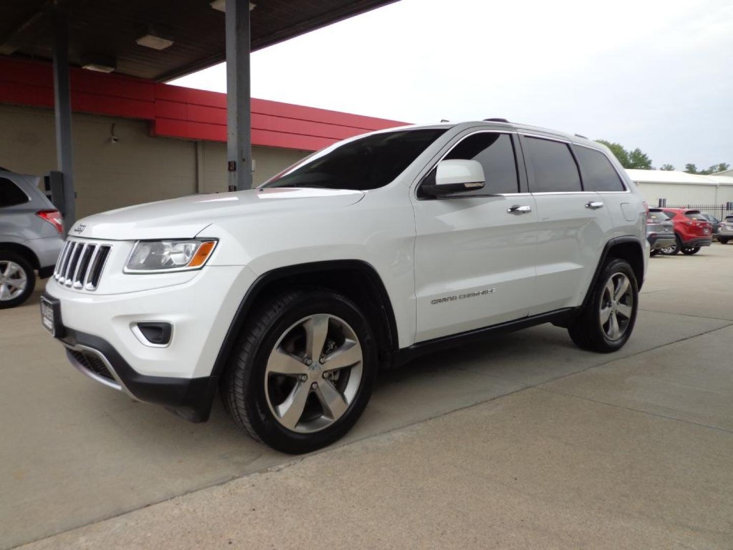 2014 WHITE JEEP GRAND CHEROKEE LIMITED (1C4RJFBG6EC) with an 3.6L engine, Automatic transmission, located at 6610 L St., Omaha, NE, 68117, (402) 731-7800, 41.212872, -96.014702 - THIS VEHICLE HAS A BEEN FULLY INSPECTED AND HAS A CLEAN TITLE WITH A FREE CARFAX REPORT PROVIDED! SHARP LOW MILE LIMITED LOADED WITH OPTIONS AND A NICE SET OF MICHELINS! *****We have found that most customers do the majority of their shopping online before visiting a ealership. For this reason- Photo#0