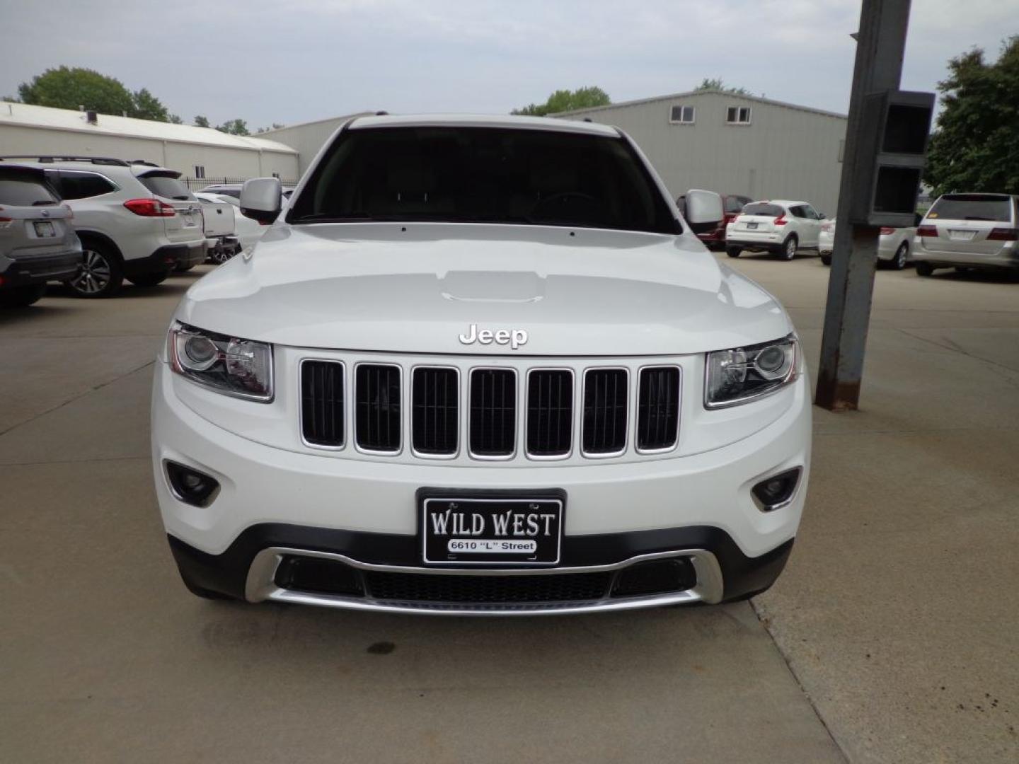 2014 WHITE JEEP GRAND CHEROKEE LIMITED (1C4RJFBG6EC) with an 3.6L engine, Automatic transmission, located at 6610 L St., Omaha, NE, 68117, (402) 731-7800, 41.212872, -96.014702 - THIS VEHICLE HAS A BEEN FULLY INSPECTED AND HAS A CLEAN TITLE WITH A FREE CARFAX REPORT PROVIDED! SHARP LOW MILE LIMITED LOADED WITH OPTIONS AND A NICE SET OF MICHELINS! *****We have found that most customers do the majority of their shopping online before visiting a ealership. For this reason- Photo#1