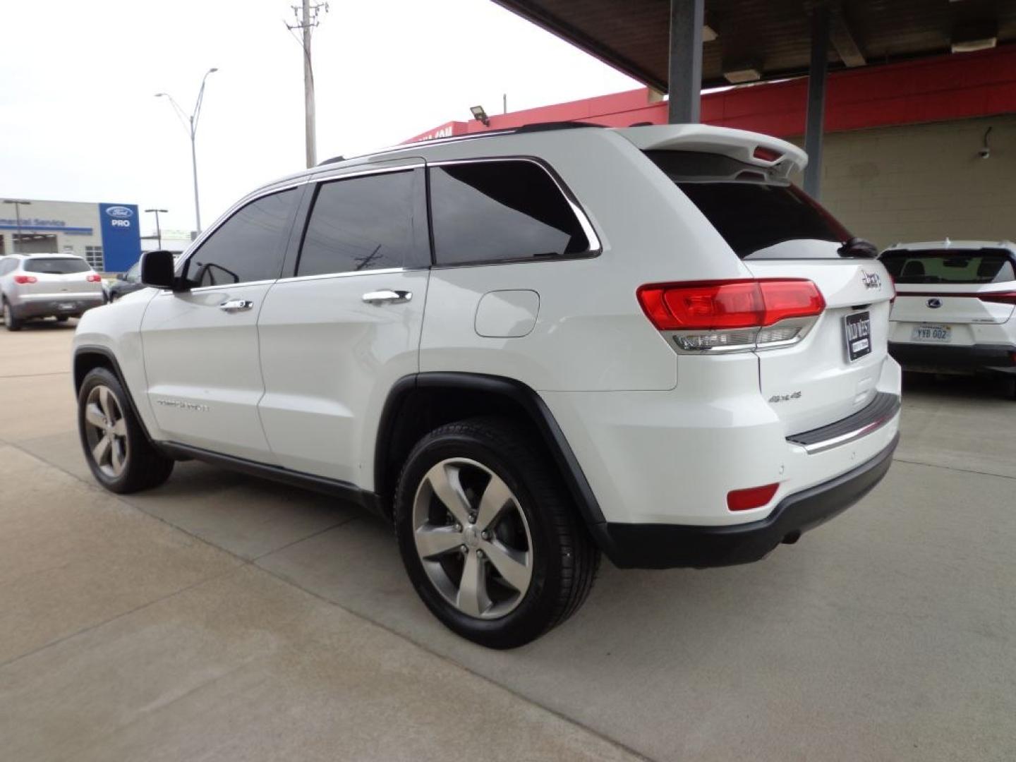 2014 WHITE JEEP GRAND CHEROKEE LIMITED (1C4RJFBG6EC) with an 3.6L engine, Automatic transmission, located at 6610 L St., Omaha, NE, 68117, (402) 731-7800, 41.212872, -96.014702 - THIS VEHICLE HAS A BEEN FULLY INSPECTED AND HAS A CLEAN TITLE WITH A FREE CARFAX REPORT PROVIDED! SHARP LOW MILE LIMITED LOADED WITH OPTIONS AND A NICE SET OF MICHELINS! *****We have found that most customers do the majority of their shopping online before visiting a ealership. For this reason- Photo#5