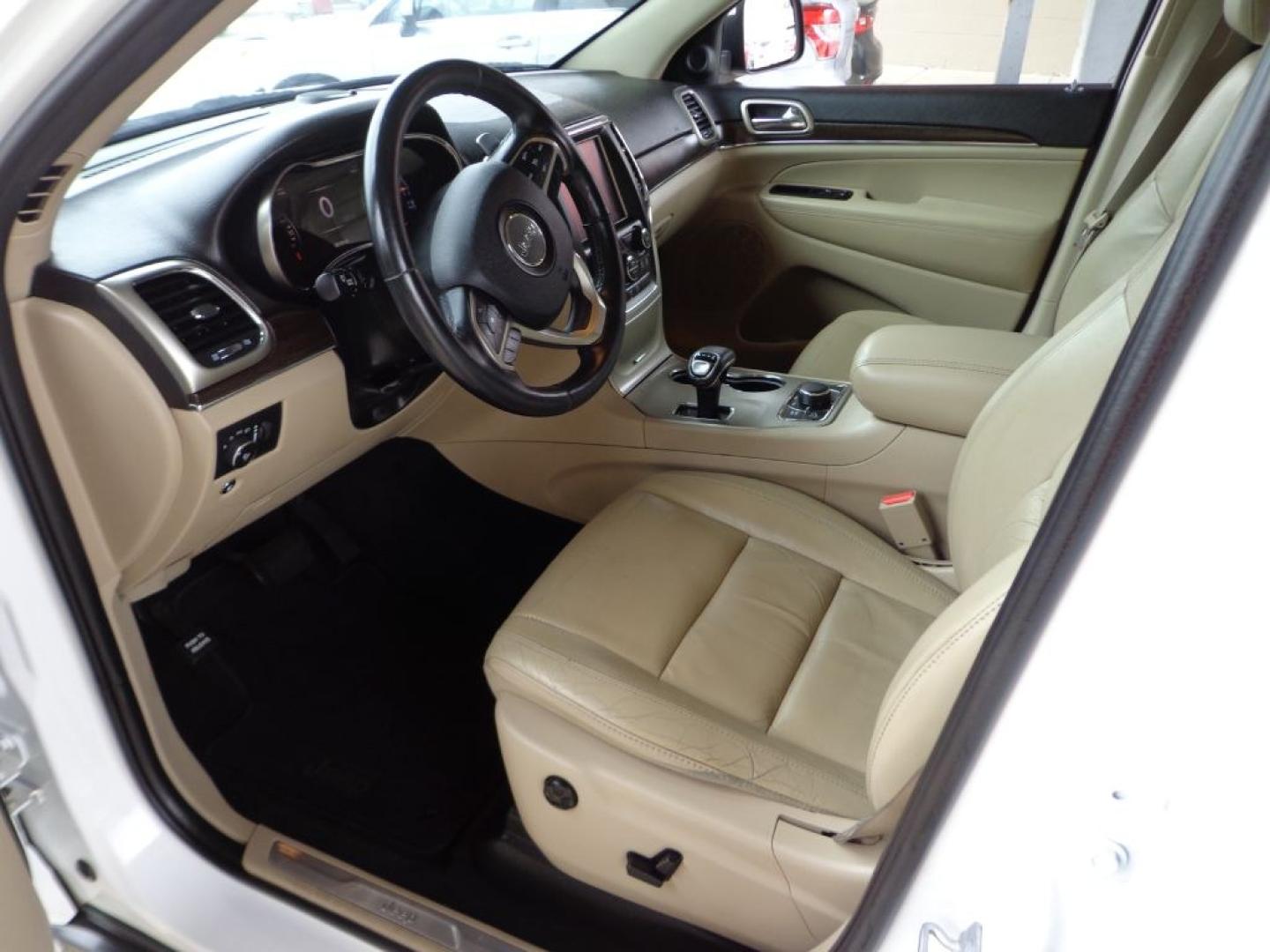 2014 WHITE JEEP GRAND CHEROKEE LIMITED (1C4RJFBG6EC) with an 3.6L engine, Automatic transmission, located at 6610 L St., Omaha, NE, 68117, (402) 731-7800, 41.212872, -96.014702 - THIS VEHICLE HAS A BEEN FULLY INSPECTED AND HAS A CLEAN TITLE WITH A FREE CARFAX REPORT PROVIDED! SHARP LOW MILE LIMITED LOADED WITH OPTIONS AND A NICE SET OF MICHELINS! *****We have found that most customers do the majority of their shopping online before visiting a ealership. For this reason- Photo#14