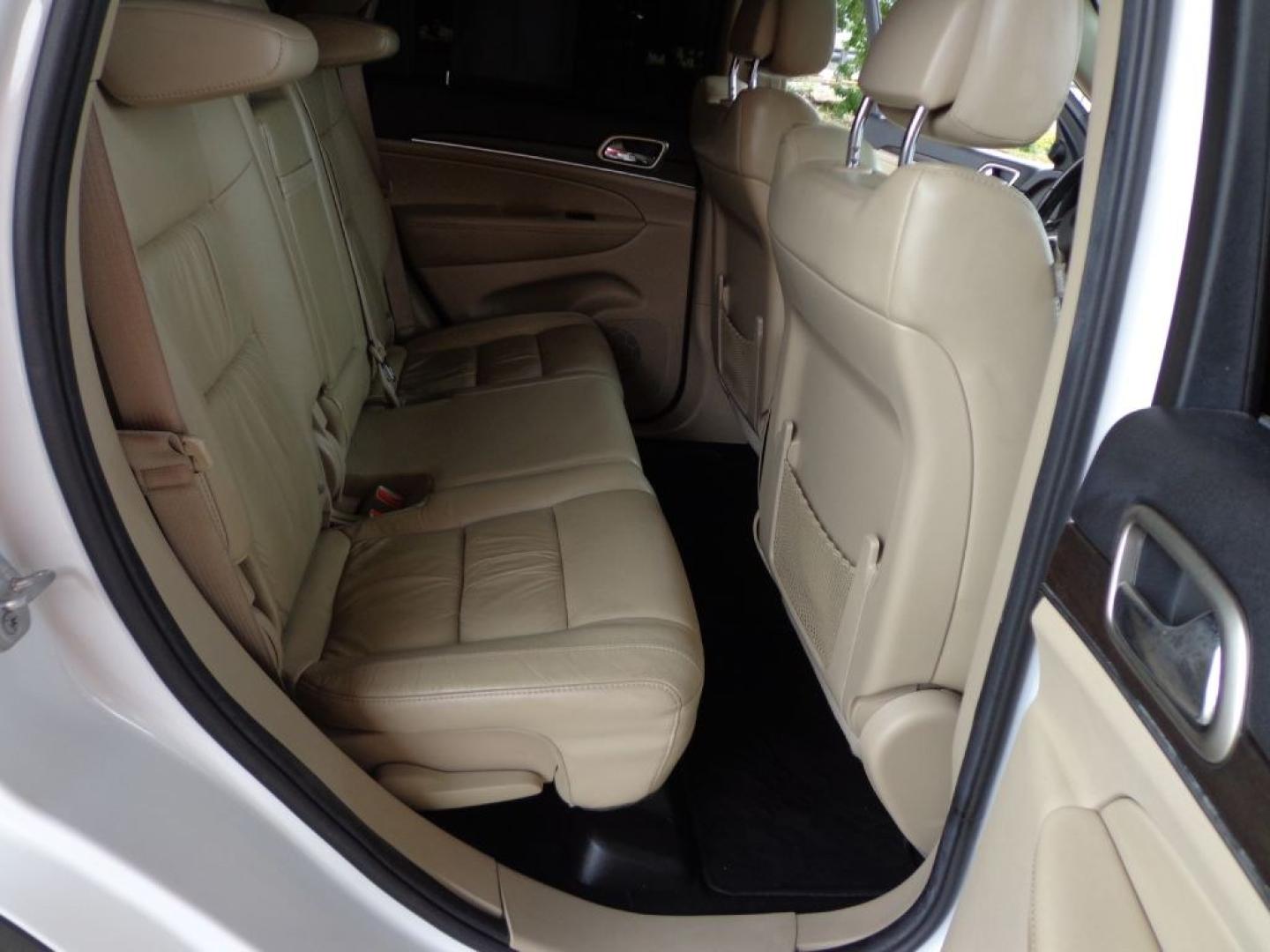 2014 WHITE JEEP GRAND CHEROKEE LIMITED (1C4RJFBG6EC) with an 3.6L engine, Automatic transmission, located at 6610 L St., Omaha, NE, 68117, (402) 731-7800, 41.212872, -96.014702 - THIS VEHICLE HAS A BEEN FULLY INSPECTED AND HAS A CLEAN TITLE WITH A FREE CARFAX REPORT PROVIDED! SHARP LOW MILE LIMITED LOADED WITH OPTIONS AND A NICE SET OF MICHELINS! *****We have found that most customers do the majority of their shopping online before visiting a ealership. For this reason- Photo#18