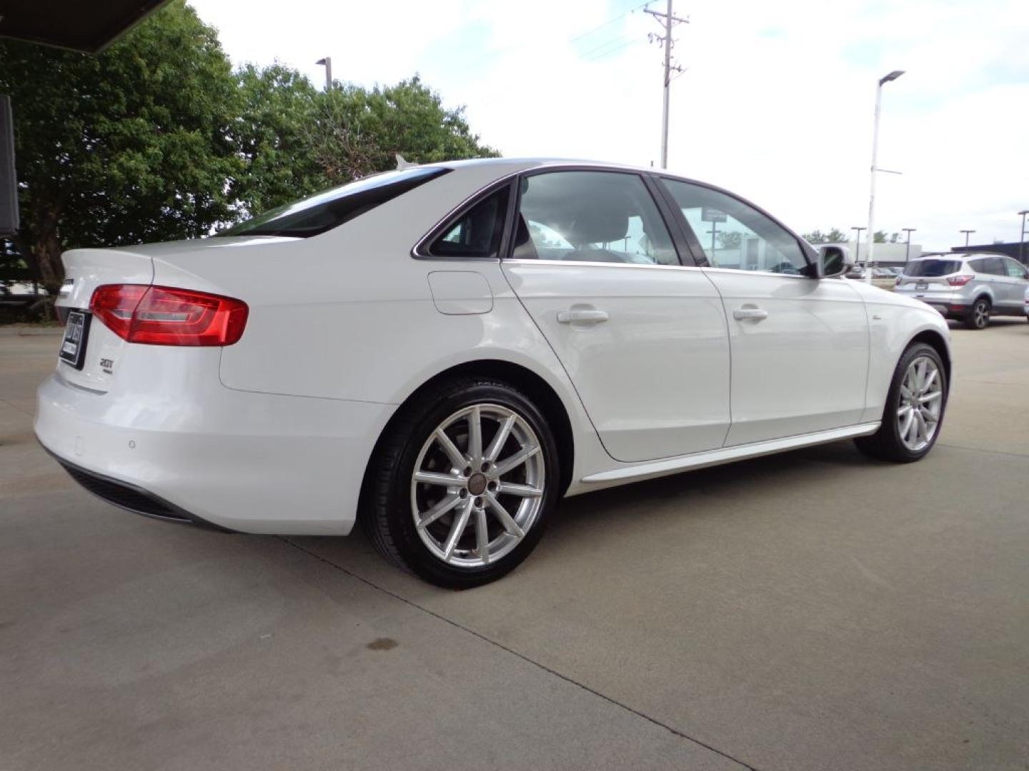 2015 WHITE AUDI A4 PREMIUM PLUS (WAUFFAFL0FN) with an 2.0L engine, Automatic transmission, located at 6610 L St., Omaha, NE, 68117, (402) 731-7800, 41.212872, -96.014702 - THIS VEHICLE HAS A BEEN FULLY INSPECTED AND HAS A CLEAN TITLE WITH A FREE CARFAX REPORT PROVIDED! 2-OWNER, CLEAN CARFAX, LOW MIEAGE, S-LINE, NAV, BLIND SPOT ASSIST AND NEWER TIRES! *****We have found that most customers do the majority of their shopping online before visiting a ealership. For t- Photo#3