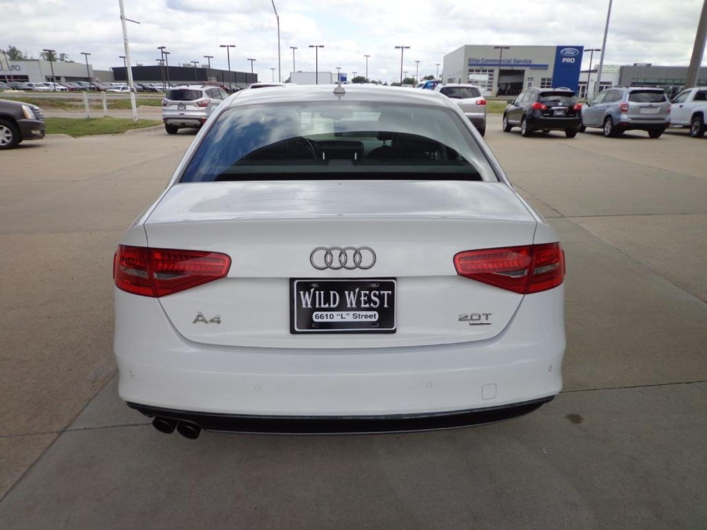 2015 WHITE AUDI A4 PREMIUM PLUS (WAUFFAFL0FN) with an 2.0L engine, Automatic transmission, located at 6610 L St., Omaha, NE, 68117, (402) 731-7800, 41.212872, -96.014702 - THIS VEHICLE HAS A BEEN FULLY INSPECTED AND HAS A CLEAN TITLE WITH A FREE CARFAX REPORT PROVIDED! 2-OWNER, CLEAN CARFAX, LOW MIEAGE, S-LINE, NAV, BLIND SPOT ASSIST AND NEWER TIRES! *****We have found that most customers do the majority of their shopping online before visiting a ealership. For t- Photo#4
