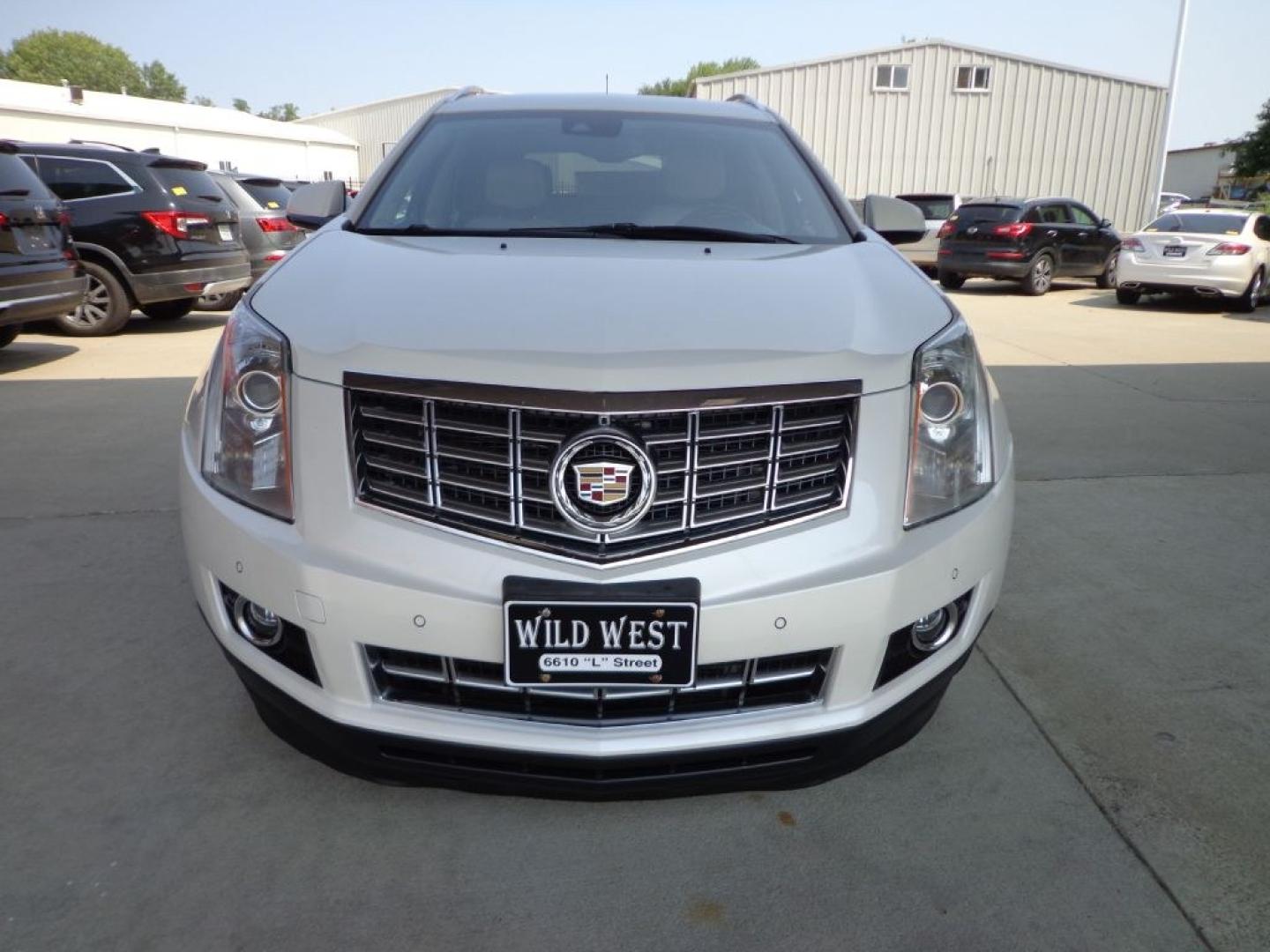 2016 WHITE CADILLAC SRX PERFORMANCE COLLECTION (3GYFNCE36GS) with an 3.6L engine, Automatic transmission, located at 6610 L St., Omaha, NE, 68117, (402) 731-7800, 41.212872, -96.014702 - THIS VEHICLE HAS A BEEN FULLY INSPECTED AND HAS A CLEAN TITLE WITH A FREE CARFAX REPORT PROVIDED! 1-OWNER, CLEAN CARFAX, LOW MILEAGE, PANORAMIC ROOF AND MUCH MORE! *****We have found that most customers do the majority of their shopping online before visiting a ealership. For this reason we fee- Photo#1