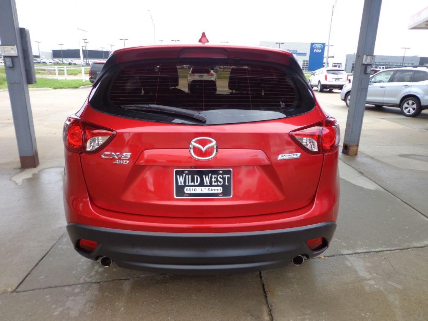 2015 RED MAZDA CX-5 GT (JM3KE4DY6F0) with an 2.5L engine, Automatic transmission, located at 6610 L St., Omaha, NE, 68117, (402) 731-7800, 41.212872, -96.014702 - THIS VEHICLE HAS A BEEN FULLY INSPECTED AND HAS A CLEAN TITLE WITH A FREE CARFAX REPORT PROVIDED! SHARP GRAND TOURING WITH A CLEAN CARFAX, LOW MILEAGE, SUNROOF, HEATED SEATS, NEWER TIRES AND MUCH MORE *****We have found that most customers do the majority of their shopping online before visit- Photo#4