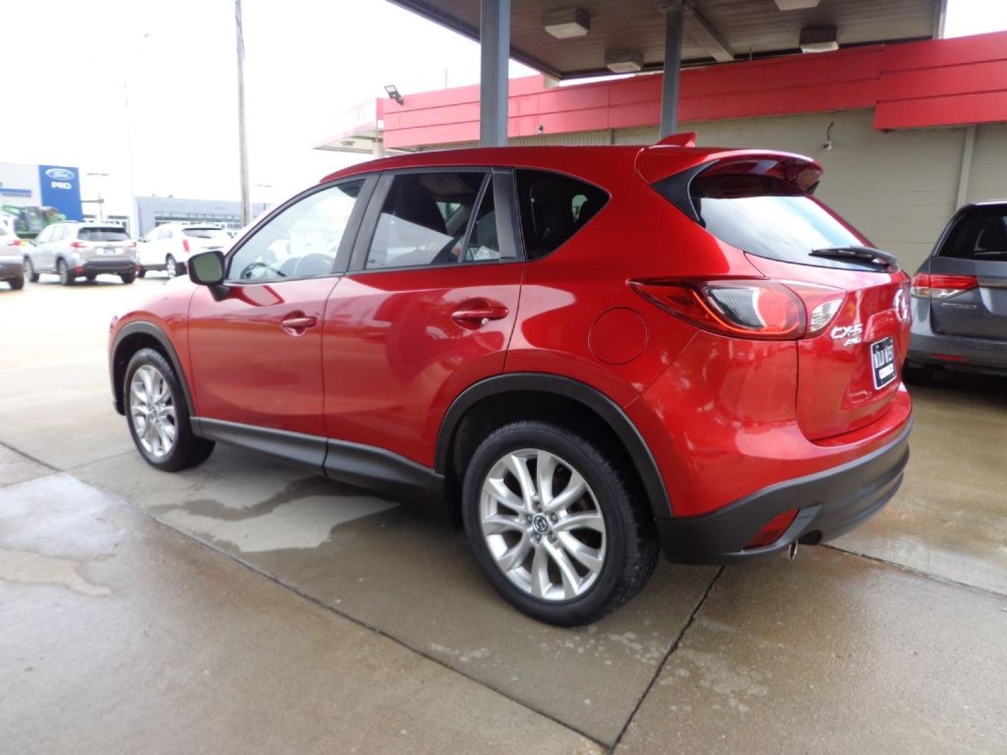 2015 RED MAZDA CX-5 GT (JM3KE4DY6F0) with an 2.5L engine, Automatic transmission, located at 6610 L St., Omaha, NE, 68117, (402) 731-7800, 41.212872, -96.014702 - THIS VEHICLE HAS A BEEN FULLY INSPECTED AND HAS A CLEAN TITLE WITH A FREE CARFAX REPORT PROVIDED! SHARP GRAND TOURING WITH A CLEAN CARFAX, LOW MILEAGE, SUNROOF, HEATED SEATS, NEWER TIRES AND MUCH MORE *****We have found that most customers do the majority of their shopping online before visit- Photo#5