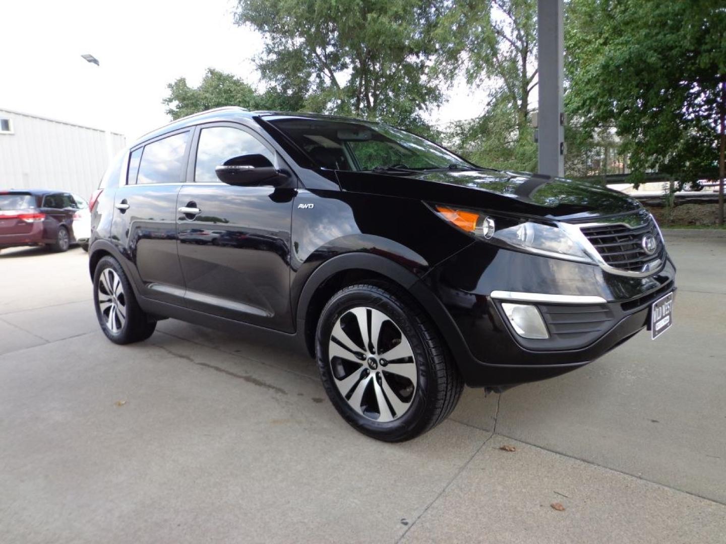 2013 BLACK KIA SPORTAGE EX (KNDPCCA20D7) with an 2.4L engine, Automatic transmission, located at 6610 L St., Omaha, NE, 68117, (402) 731-7800, 41.212872, -96.014702 - THIS VEHICLE HAS A BEEN FULLY INSPECTED AND HAS A CLEAN TITLE WITH A FREE CARFAX REPORT PROVIDED! 2-OWNER, CLEAN CARFAX, WELL CARED FOR, ALL WEATHER MATS, LEATHER, SUNROOF AND NEWER TIRES! *****We have found that most customers do the majority of their shopping online before visiting a ealershi- Photo#2
