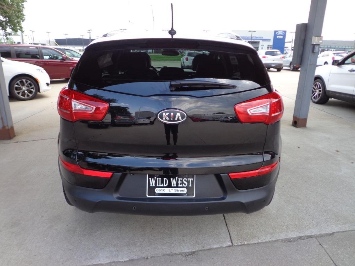 2013 BLACK KIA SPORTAGE EX (KNDPCCA20D7) with an 2.4L engine, Automatic transmission, located at 6610 L St., Omaha, NE, 68117, (402) 731-7800, 41.212872, -96.014702 - THIS VEHICLE HAS A BEEN FULLY INSPECTED AND HAS A CLEAN TITLE WITH A FREE CARFAX REPORT PROVIDED! 2-OWNER, CLEAN CARFAX, WELL CARED FOR, ALL WEATHER MATS, LEATHER, SUNROOF AND NEWER TIRES! *****We have found that most customers do the majority of their shopping online before visiting a ealershi- Photo#4