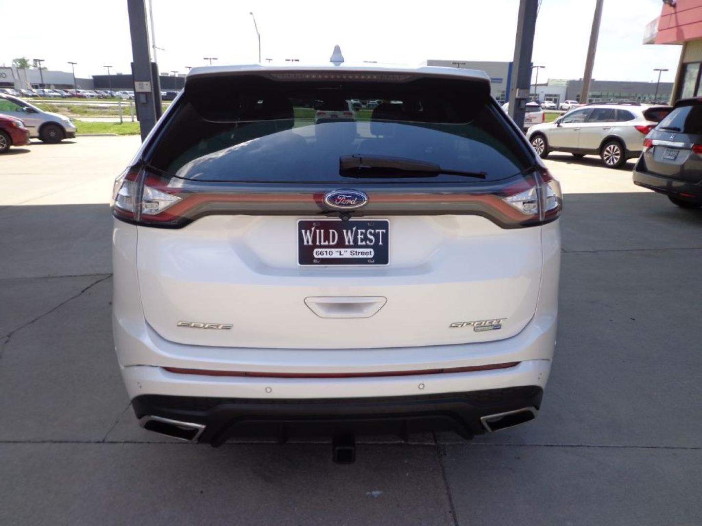 2016 WHITE FORD EDGE SPORT (2FMPK4AP8GB) with an 2.7L engine, Automatic transmission, located at 6610 L St., Omaha, NE, 68117, (402) 731-7800, 41.212872, -96.014702 - THIS VEHICLE HAS A BEEN FULLY INSPECTED AND HAS A CLEAN TITLE WITH A FREE CARFAX REPORT PROVIDED! 1-OWNER, CLEAN CARFAX, LOW MILEAGE, PANORAMIC ROOF, NAV, 20IN WHEELS, HID HEADLIGHTS, HEATED-COOLED FRONT SEATS, HEATED REAR SEATS/STEERING WHEEL, FRONT 180 CAMERA, PARK ASSIST AND A NICE SET OF MICH- Photo#4