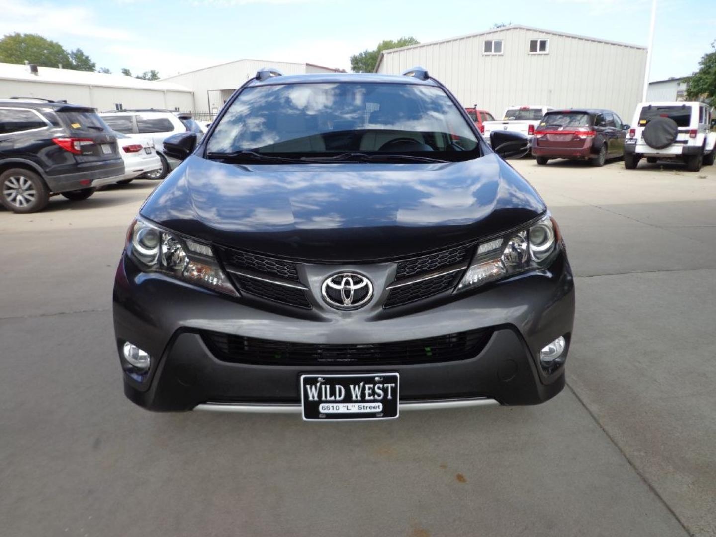 2014 GRAY TOYOTA RAV4 LIMITED (2T3DFREV1EW) with an 2.5L engine, Automatic transmission, located at 6610 L St., Omaha, NE, 68117, (402) 731-7800, 41.212872, -96.014702 - THIS VEHICLE HAS A BEEN FULLY INSPECTED AND HAS A CLEAN TITLE WITH A FREE CARFAX REPORT PROVIDED! 1-OWNER, CLEAN CARFAX, LOW MILEAGE, HEATED LEATHER, SUNROOF, NAV, BACKUP CAM AND NEWER TIRES! *****We have found that most customers do the majority of their shopping online before visiting a ealer- Photo#1