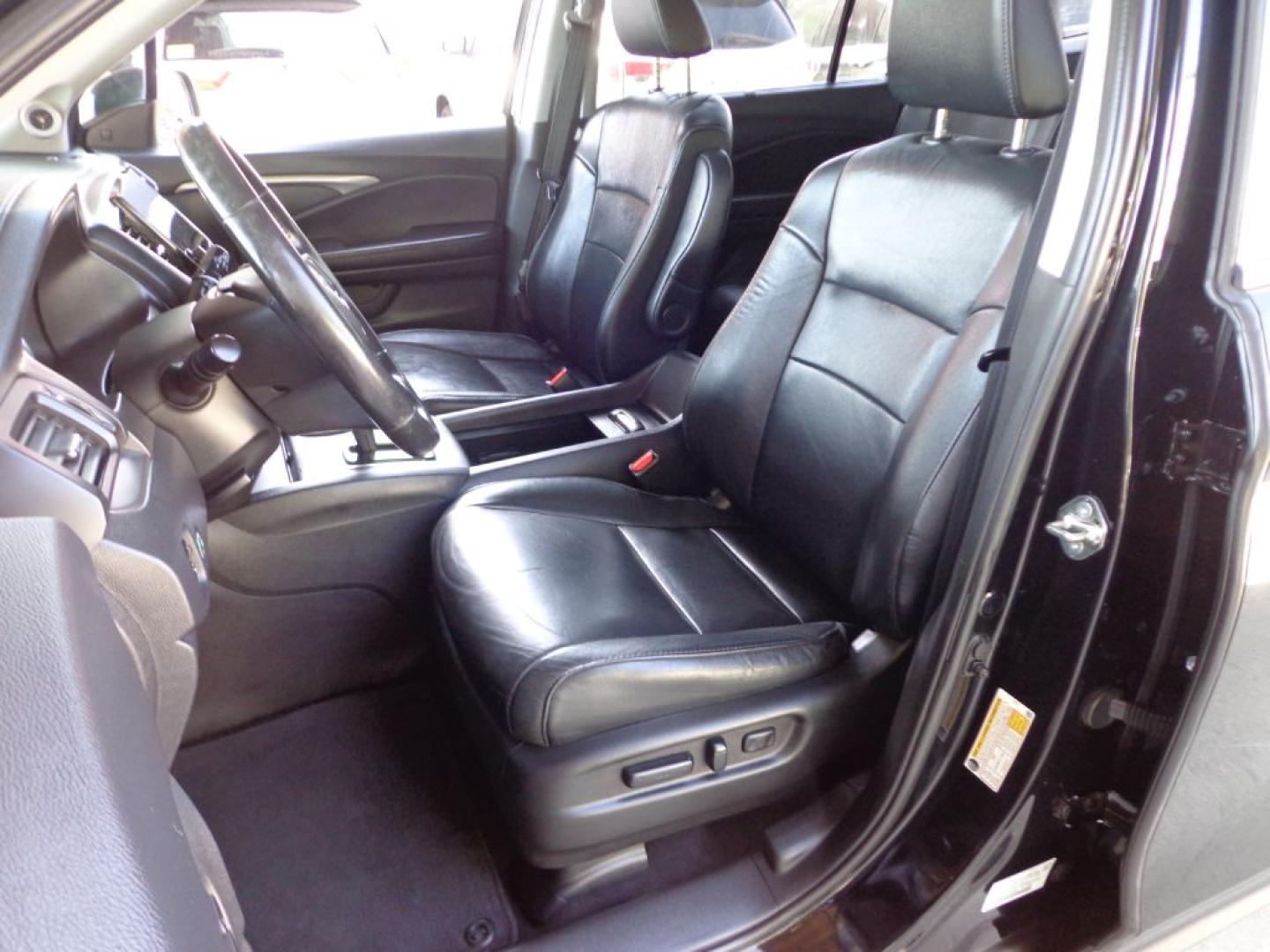 2019 BLACK HONDA PILOT EXL (5FNYF6H5XKB) with an 3.5L engine, Automatic transmission, located at 6610 L St., Omaha, NE, 68117, (402) 731-7800, 41.212872, -96.014702 - THIS VEHICLE HAS A BEEN FULLY INSPECTED AND HAS A CLEAN TITLE WITH A FREE CARFAX REPORT PROVIDED! SHARP 2-OWNER WITH A CLEAN CARFAX AND NEWER TIRES! *****We have found that most customers do the majority of their shopping online before visiting a ealership. For this reason we feel it necessary- Photo#13