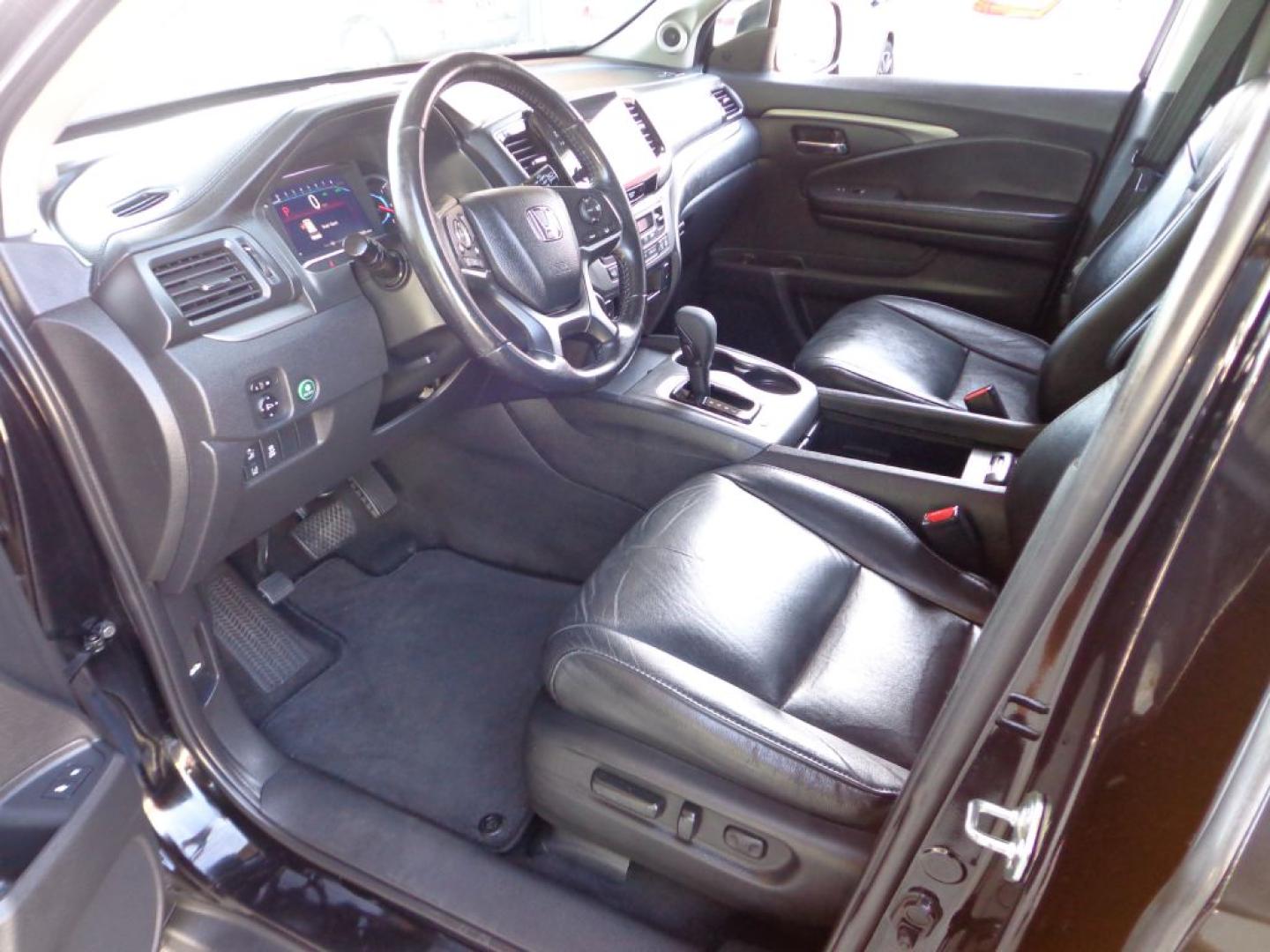 2019 BLACK HONDA PILOT EXL (5FNYF6H5XKB) with an 3.5L engine, Automatic transmission, located at 6610 L St., Omaha, NE, 68117, (402) 731-7800, 41.212872, -96.014702 - THIS VEHICLE HAS A BEEN FULLY INSPECTED AND HAS A CLEAN TITLE WITH A FREE CARFAX REPORT PROVIDED! SHARP 2-OWNER WITH A CLEAN CARFAX AND NEWER TIRES! *****We have found that most customers do the majority of their shopping online before visiting a ealership. For this reason we feel it necessary- Photo#14