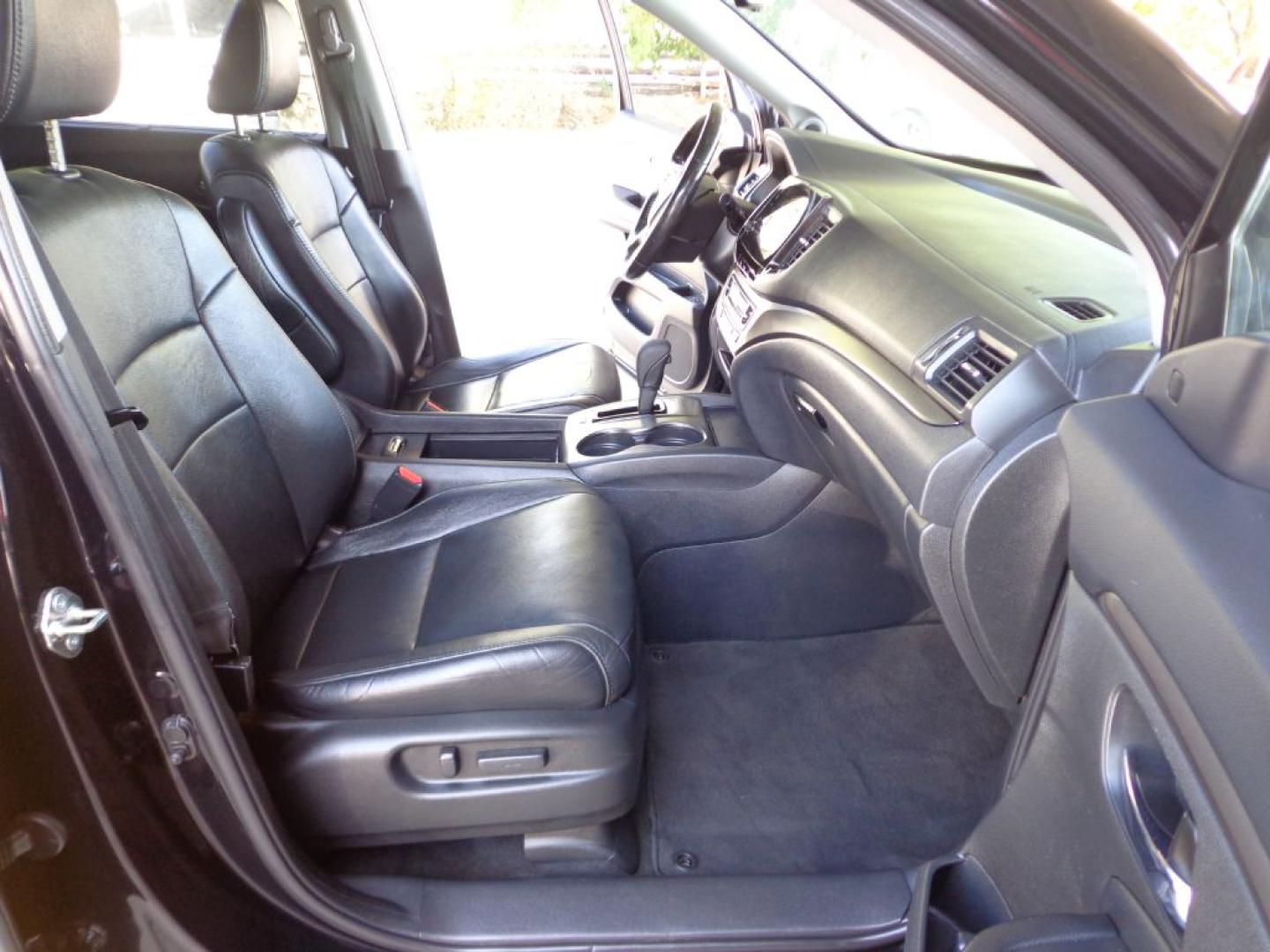 2019 BLACK HONDA PILOT EXL (5FNYF6H5XKB) with an 3.5L engine, Automatic transmission, located at 6610 L St., Omaha, NE, 68117, (402) 731-7800, 41.212872, -96.014702 - THIS VEHICLE HAS A BEEN FULLY INSPECTED AND HAS A CLEAN TITLE WITH A FREE CARFAX REPORT PROVIDED! SHARP 2-OWNER WITH A CLEAN CARFAX AND NEWER TIRES! *****We have found that most customers do the majority of their shopping online before visiting a ealership. For this reason we feel it necessary- Photo#15