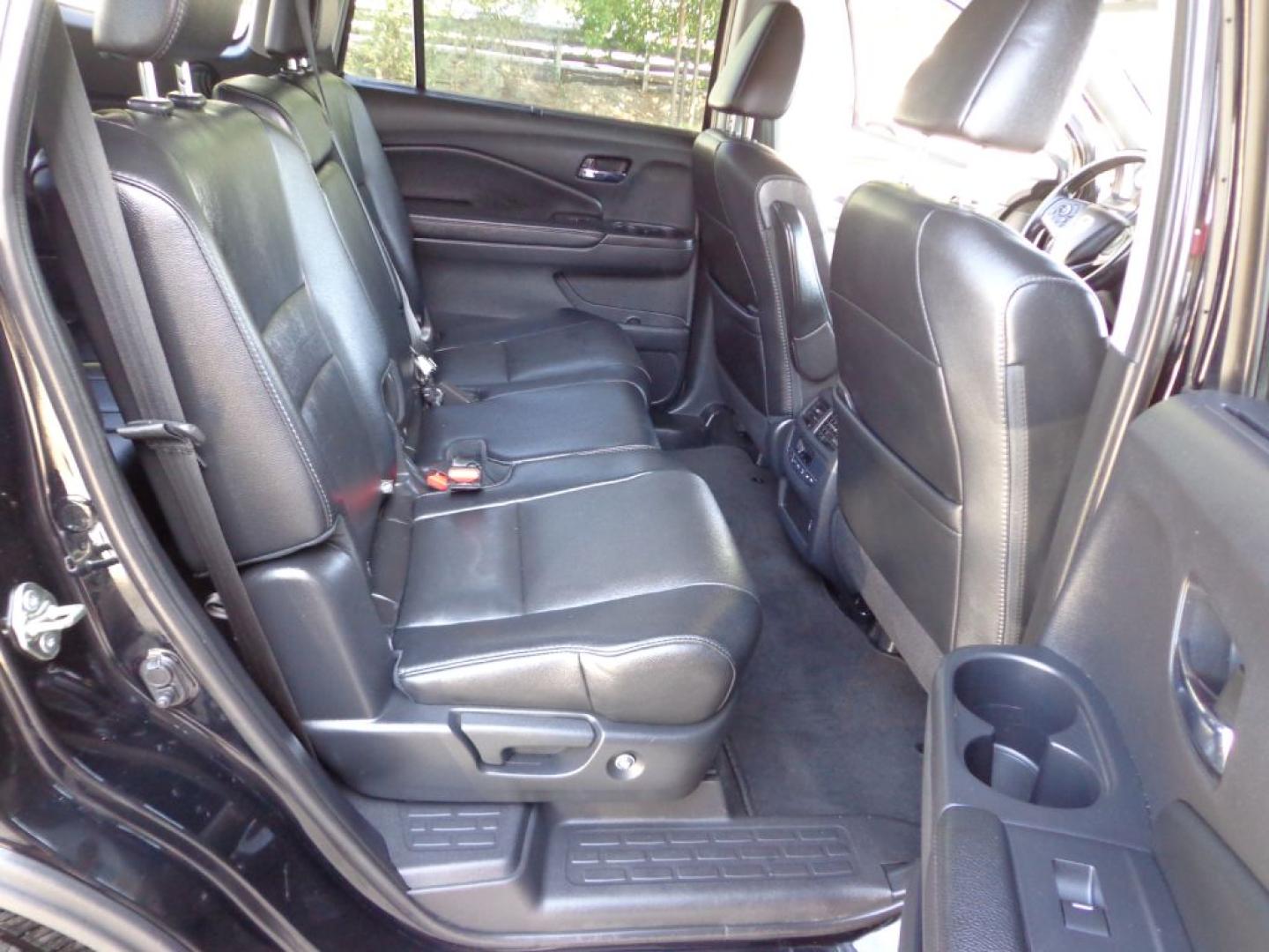 2019 BLACK HONDA PILOT EXL (5FNYF6H5XKB) with an 3.5L engine, Automatic transmission, located at 6610 L St., Omaha, NE, 68117, (402) 731-7800, 41.212872, -96.014702 - THIS VEHICLE HAS A BEEN FULLY INSPECTED AND HAS A CLEAN TITLE WITH A FREE CARFAX REPORT PROVIDED! SHARP 2-OWNER WITH A CLEAN CARFAX AND NEWER TIRES! *****We have found that most customers do the majority of their shopping online before visiting a ealership. For this reason we feel it necessary- Photo#18