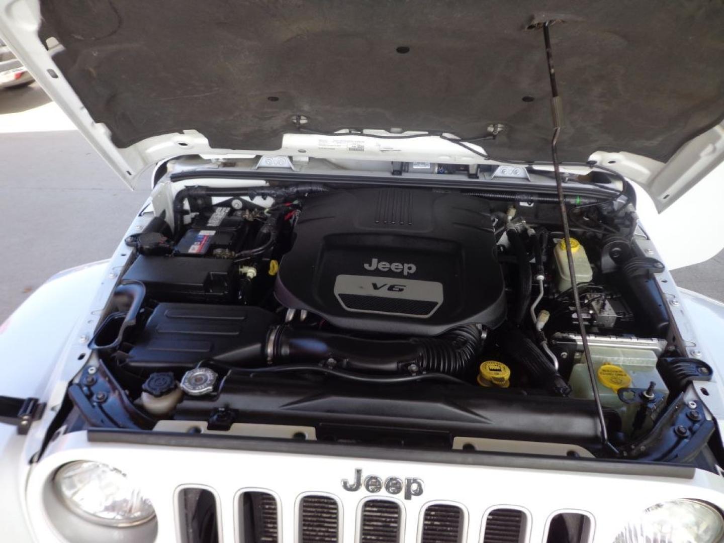 2016 WHITE JEEP WRANGLER UNLIMI SAHARA (1C4BJWEG6GL) with an 3.6L engine, Automatic transmission, located at 6610 L St., Omaha, NE, 68117, (402) 731-7800, 41.212872, -96.014702 - THIS VEHICLE HAS A BEEN FULLY INSPECTED AND HAS A CLEAN TITLE WITH A FREE CARFAX REPORT PROVIDED! *****We have found that most customers do the majority of their shopping online before visiting a ealership. For this reason we feel it necessary to have a competitive price on our used vehicles rig- Photo#7