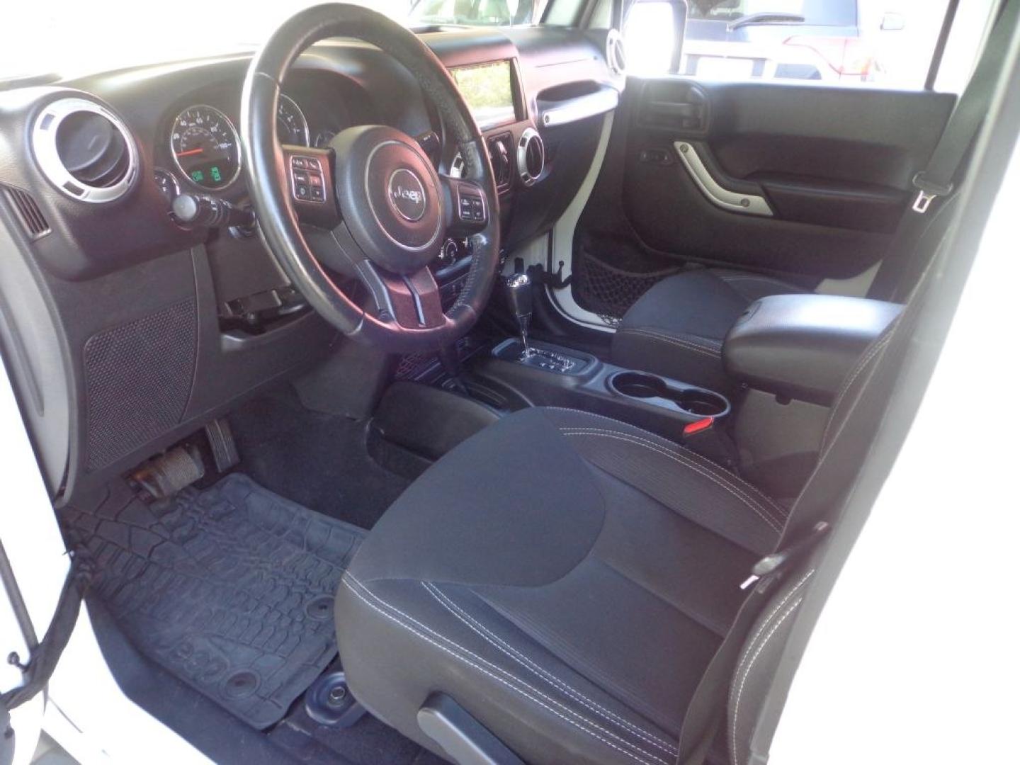 2016 WHITE JEEP WRANGLER UNLIMI SAHARA (1C4BJWEG6GL) with an 3.6L engine, Automatic transmission, located at 6610 L St., Omaha, NE, 68117, (402) 731-7800, 41.212872, -96.014702 - THIS VEHICLE HAS A BEEN FULLY INSPECTED AND HAS A CLEAN TITLE WITH A FREE CARFAX REPORT PROVIDED! *****We have found that most customers do the majority of their shopping online before visiting a ealership. For this reason we feel it necessary to have a competitive price on our used vehicles rig- Photo#10