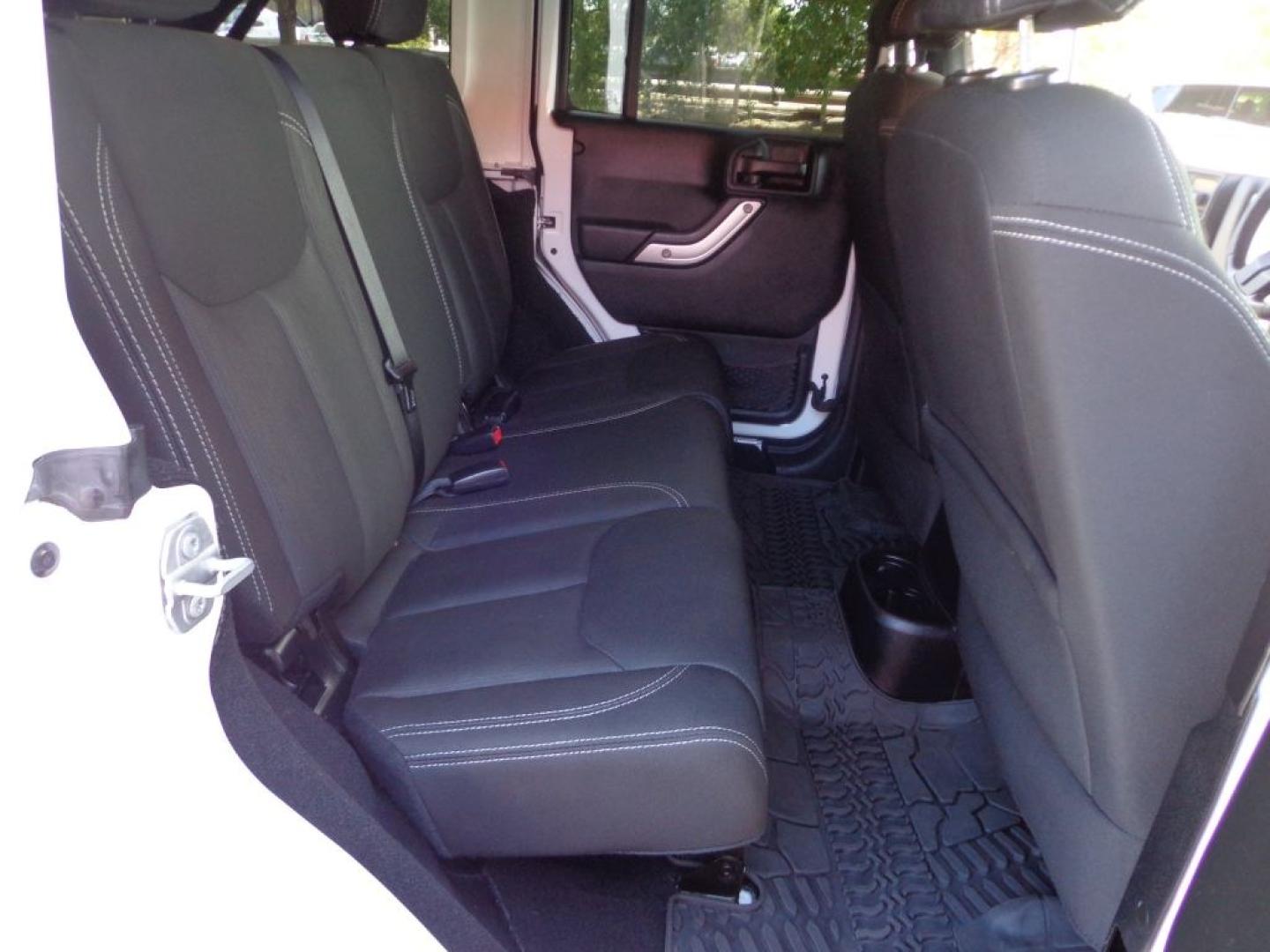 2016 WHITE JEEP WRANGLER UNLIMI SAHARA (1C4BJWEG6GL) with an 3.6L engine, Automatic transmission, located at 6610 L St., Omaha, NE, 68117, (402) 731-7800, 41.212872, -96.014702 - THIS VEHICLE HAS A BEEN FULLY INSPECTED AND HAS A CLEAN TITLE WITH A FREE CARFAX REPORT PROVIDED! *****We have found that most customers do the majority of their shopping online before visiting a ealership. For this reason we feel it necessary to have a competitive price on our used vehicles rig- Photo#14