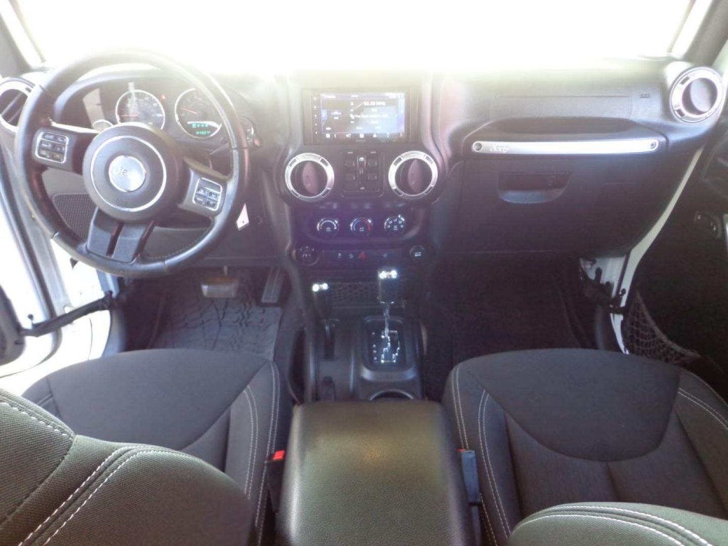 2016 WHITE JEEP WRANGLER UNLIMI SAHARA (1C4BJWEG6GL) with an 3.6L engine, Automatic transmission, located at 6610 L St., Omaha, NE, 68117, (402) 731-7800, 41.212872, -96.014702 - THIS VEHICLE HAS A BEEN FULLY INSPECTED AND HAS A CLEAN TITLE WITH A FREE CARFAX REPORT PROVIDED! *****We have found that most customers do the majority of their shopping online before visiting a ealership. For this reason we feel it necessary to have a competitive price on our used vehicles rig- Photo#18
