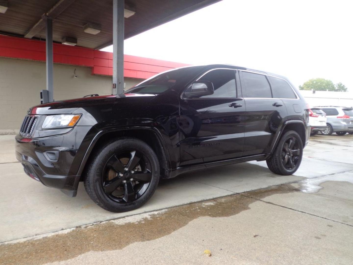 2015 BLACK JEEP GRAND CHEROKEE ALTITUDE (1C4RJFAG2FC) with an 3.6L engine, Automatic transmission, located at 6610 L St., Omaha, NE, 68117, (402) 731-7800, 41.212872, -96.014702- Photo#0