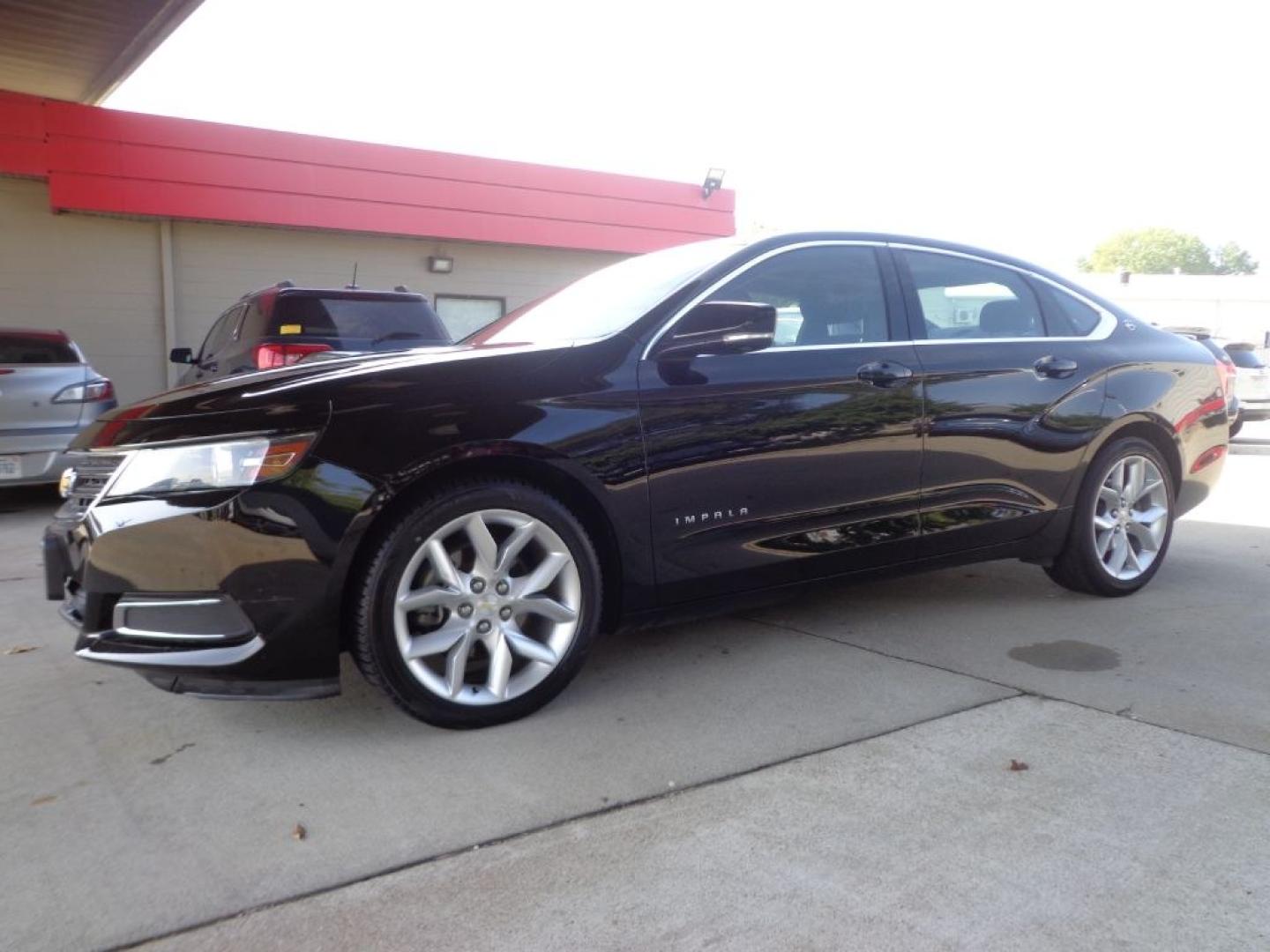 2014 BLACK CHEVROLET IMPALA LT (1G1125S31EU) with an 3.6L engine, Automatic transmission, located at 6610 L St., Omaha, NE, 68117, (402) 731-7800, 41.212872, -96.014702 - THIS VEHICLE HAS A BEEN FULLY INSPECTED AND HAS A CLEAN TITLE WITH A FREE CARFAX REPORT PROVIDED! SHARP. 1-OWNER, CLEAN CARFAX, LOW MILEAGE, SUNROOF, DRIVER ASSIST, HEATED LEATHER AND NEWER TIRES! *****We have found that most customers do the majority of their shopping online before visiting a- Photo#0