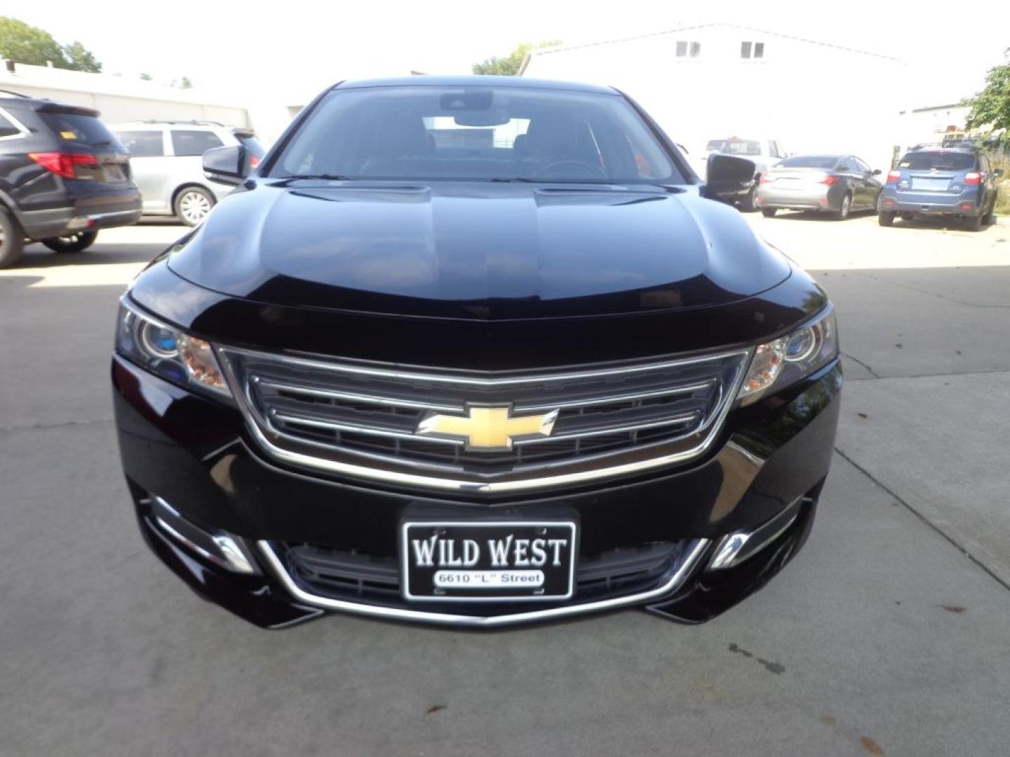 2014 BLACK CHEVROLET IMPALA LT (1G1125S31EU) with an 3.6L engine, Automatic transmission, located at 6610 L St., Omaha, NE, 68117, (402) 731-7800, 41.212872, -96.014702 - THIS VEHICLE HAS A BEEN FULLY INSPECTED AND HAS A CLEAN TITLE WITH A FREE CARFAX REPORT PROVIDED! SHARP. 1-OWNER, CLEAN CARFAX, LOW MILEAGE, SUNROOF, DRIVER ASSIST, HEATED LEATHER AND NEWER TIRES! *****We have found that most customers do the majority of their shopping online before visiting a- Photo#1