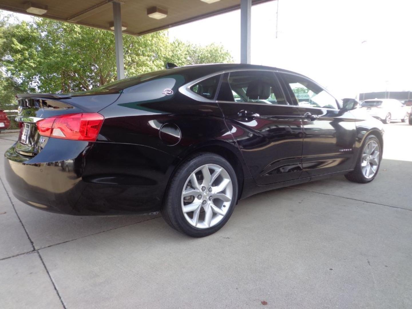 2014 BLACK CHEVROLET IMPALA LT (1G1125S31EU) with an 3.6L engine, Automatic transmission, located at 6610 L St., Omaha, NE, 68117, (402) 731-7800, 41.212872, -96.014702 - THIS VEHICLE HAS A BEEN FULLY INSPECTED AND HAS A CLEAN TITLE WITH A FREE CARFAX REPORT PROVIDED! SHARP. 1-OWNER, CLEAN CARFAX, LOW MILEAGE, SUNROOF, DRIVER ASSIST, HEATED LEATHER AND NEWER TIRES! *****We have found that most customers do the majority of their shopping online before visiting a- Photo#3