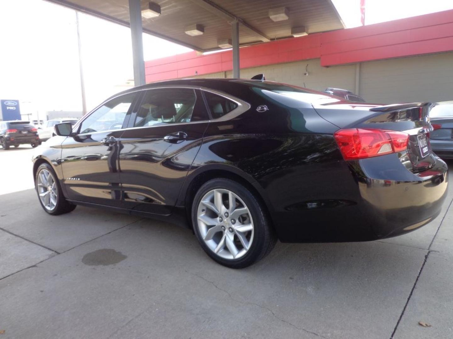 2014 BLACK CHEVROLET IMPALA LT (1G1125S31EU) with an 3.6L engine, Automatic transmission, located at 6610 L St., Omaha, NE, 68117, (402) 731-7800, 41.212872, -96.014702 - THIS VEHICLE HAS A BEEN FULLY INSPECTED AND HAS A CLEAN TITLE WITH A FREE CARFAX REPORT PROVIDED! SHARP. 1-OWNER, CLEAN CARFAX, LOW MILEAGE, SUNROOF, DRIVER ASSIST, HEATED LEATHER AND NEWER TIRES! *****We have found that most customers do the majority of their shopping online before visiting a- Photo#5
