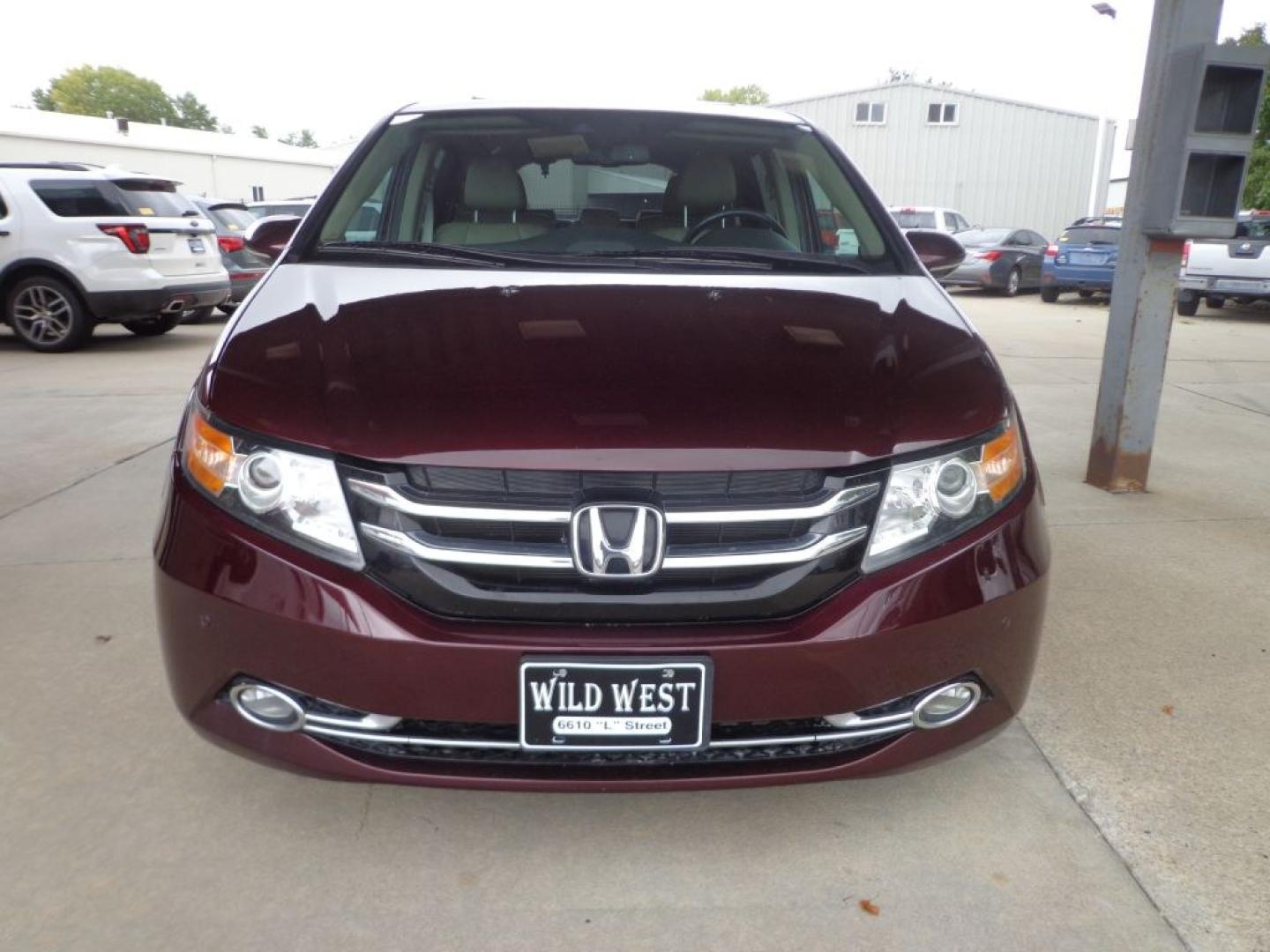 2014 MAROON HONDA ODYSSEY TOURING ELITE (5FNRL5H9XEB) with an 3.5L engine, Automatic transmission, located at 6610 L St., Omaha, NE, 68117, (402) 731-7800, 41.212872, -96.014702 - THIS VEHICLE HAS A BEEN FULLY INSPECTED AND HAS A CLEAN TITLE WITH A FREE CARFAX REPORT PROVIDED! 1-OWNER, CLEAN CARFAX, LOW MILEAGE, NAV, REAR ENTERTAINMENT AND NEWER TIRES! *****We have found that most customers do the majority of their shopping online before visiting a ealership. For this re- Photo#1