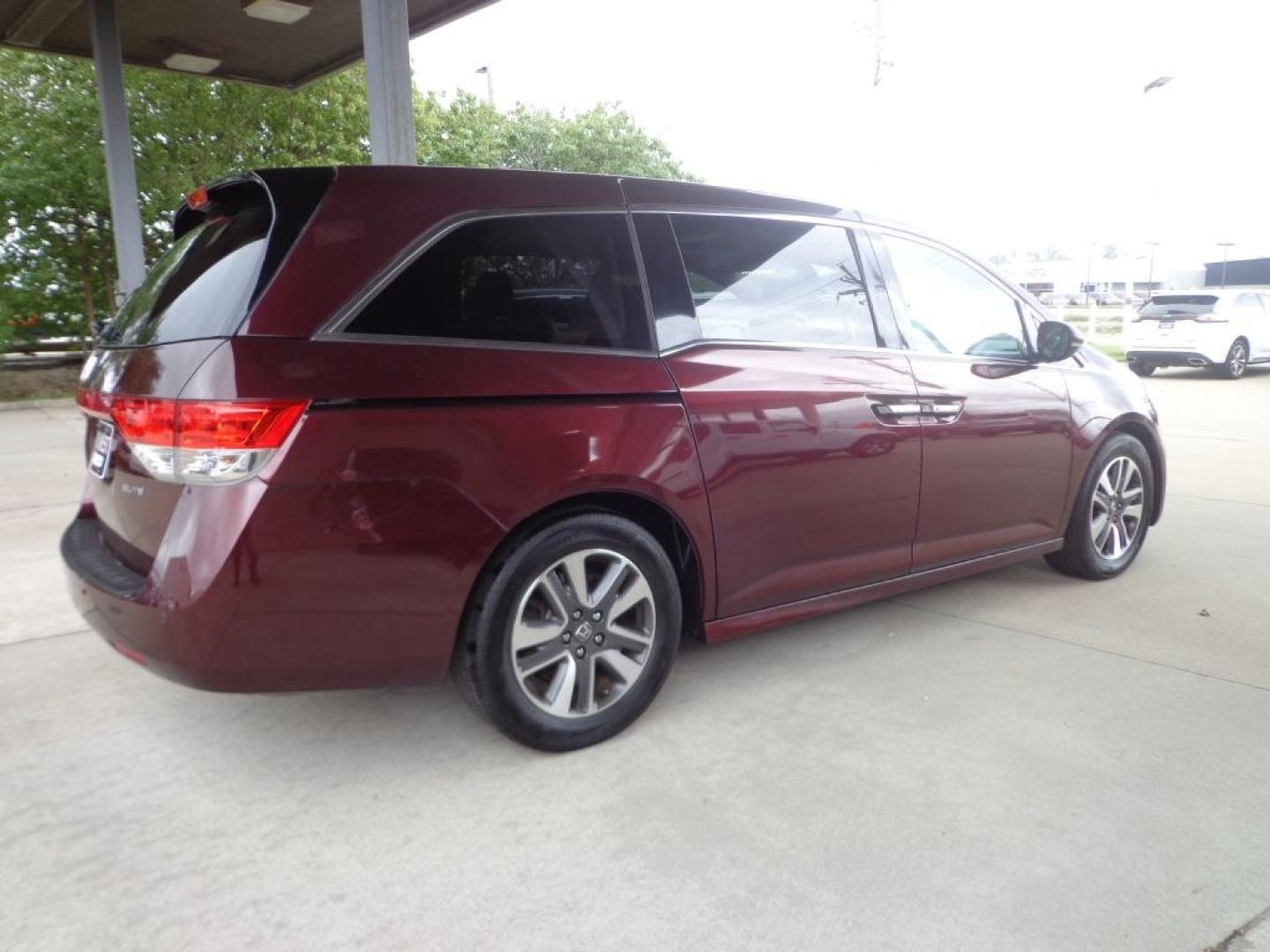 2014 MAROON HONDA ODYSSEY TOURING ELITE (5FNRL5H9XEB) with an 3.5L engine, Automatic transmission, located at 6610 L St., Omaha, NE, 68117, (402) 731-7800, 41.212872, -96.014702 - THIS VEHICLE HAS A BEEN FULLY INSPECTED AND HAS A CLEAN TITLE WITH A FREE CARFAX REPORT PROVIDED! 1-OWNER, CLEAN CARFAX, LOW MILEAGE, NAV, REAR ENTERTAINMENT AND NEWER TIRES! *****We have found that most customers do the majority of their shopping online before visiting a ealership. For this re- Photo#3