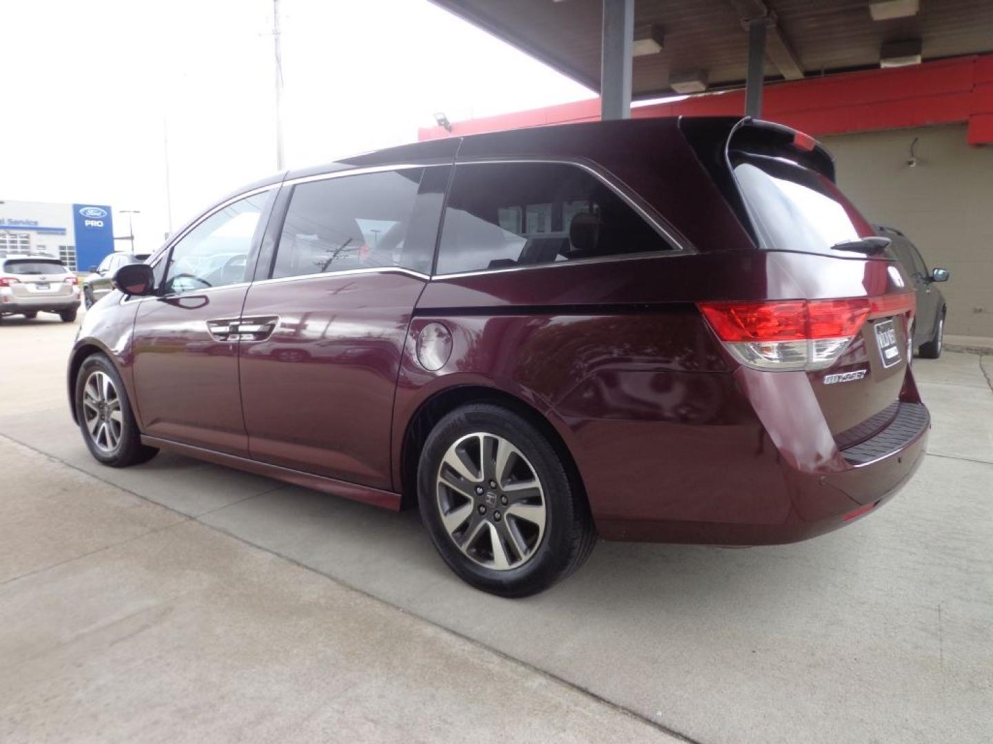 2014 MAROON HONDA ODYSSEY TOURING ELITE (5FNRL5H9XEB) with an 3.5L engine, Automatic transmission, located at 6610 L St., Omaha, NE, 68117, (402) 731-7800, 41.212872, -96.014702 - THIS VEHICLE HAS A BEEN FULLY INSPECTED AND HAS A CLEAN TITLE WITH A FREE CARFAX REPORT PROVIDED! 1-OWNER, CLEAN CARFAX, LOW MILEAGE, NAV, REAR ENTERTAINMENT AND NEWER TIRES! *****We have found that most customers do the majority of their shopping online before visiting a ealership. For this re- Photo#5