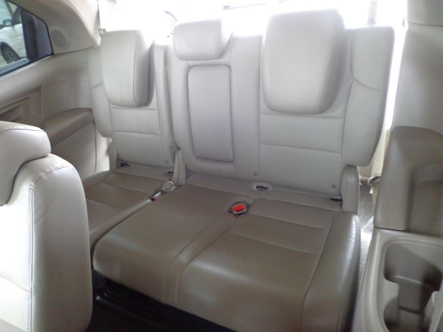2014 MAROON HONDA ODYSSEY TOURING ELITE (5FNRL5H9XEB) with an 3.5L engine, Automatic transmission, located at 6610 L St., Omaha, NE, 68117, (402) 731-7800, 41.212872, -96.014702 - THIS VEHICLE HAS A BEEN FULLY INSPECTED AND HAS A CLEAN TITLE WITH A FREE CARFAX REPORT PROVIDED! 1-OWNER, CLEAN CARFAX, LOW MILEAGE, NAV, REAR ENTERTAINMENT AND NEWER TIRES! *****We have found that most customers do the majority of their shopping online before visiting a ealership. For this re- Photo#20