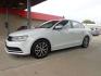 2017 WHITE VOLKSWAGEN JETTA SE (3VWDB7AJ2HM) with an 1.4L engine, Automatic transmission, located at 6610 L St., Omaha, NE, 68117, (402) 731-7800, 41.212872, -96.014702 - THIS VEHICLE HAS A BEEN FULLY INSPECTED AND HAS A CLEAN TITLE WITH A FREE CARFAX REPORT PROVIDED! 2-OWNER, CLEAN CARFAX, LOW MILEAGE, HEATED LEATHER, SUROOF AND NEWER TIRES! *****We have found that most customers do the majority of their shopping online before visiting a ealership. For this rea- Photo#0