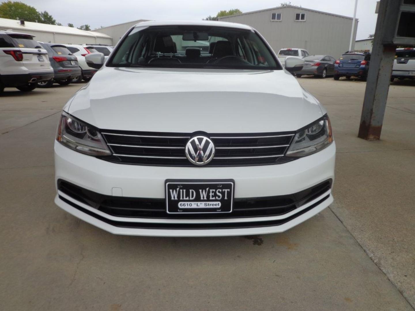 2017 WHITE VOLKSWAGEN JETTA SE (3VWDB7AJ2HM) with an 1.4L engine, Automatic transmission, located at 6610 L St., Omaha, NE, 68117, (402) 731-7800, 41.212872, -96.014702 - THIS VEHICLE HAS A BEEN FULLY INSPECTED AND HAS A CLEAN TITLE WITH A FREE CARFAX REPORT PROVIDED! 2-OWNER, CLEAN CARFAX, LOW MILEAGE, HEATED LEATHER, SUROOF AND NEWER TIRES! *****We have found that most customers do the majority of their shopping online before visiting a ealership. For this rea- Photo#1