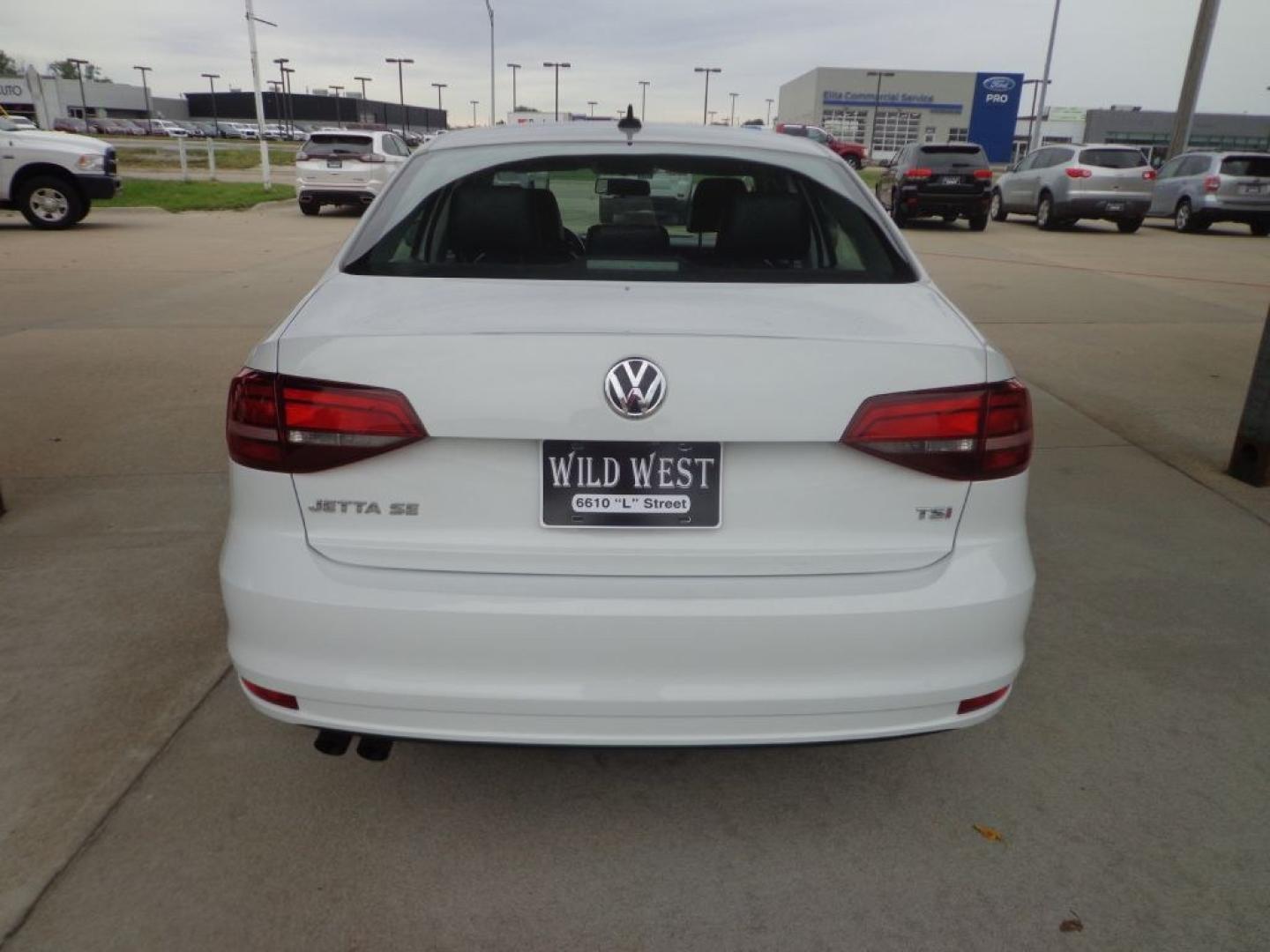 2017 WHITE VOLKSWAGEN JETTA SE (3VWDB7AJ2HM) with an 1.4L engine, Automatic transmission, located at 6610 L St., Omaha, NE, 68117, (402) 731-7800, 41.212872, -96.014702 - THIS VEHICLE HAS A BEEN FULLY INSPECTED AND HAS A CLEAN TITLE WITH A FREE CARFAX REPORT PROVIDED! 2-OWNER, CLEAN CARFAX, LOW MILEAGE, HEATED LEATHER, SUROOF AND NEWER TIRES! *****We have found that most customers do the majority of their shopping online before visiting a ealership. For this rea- Photo#4