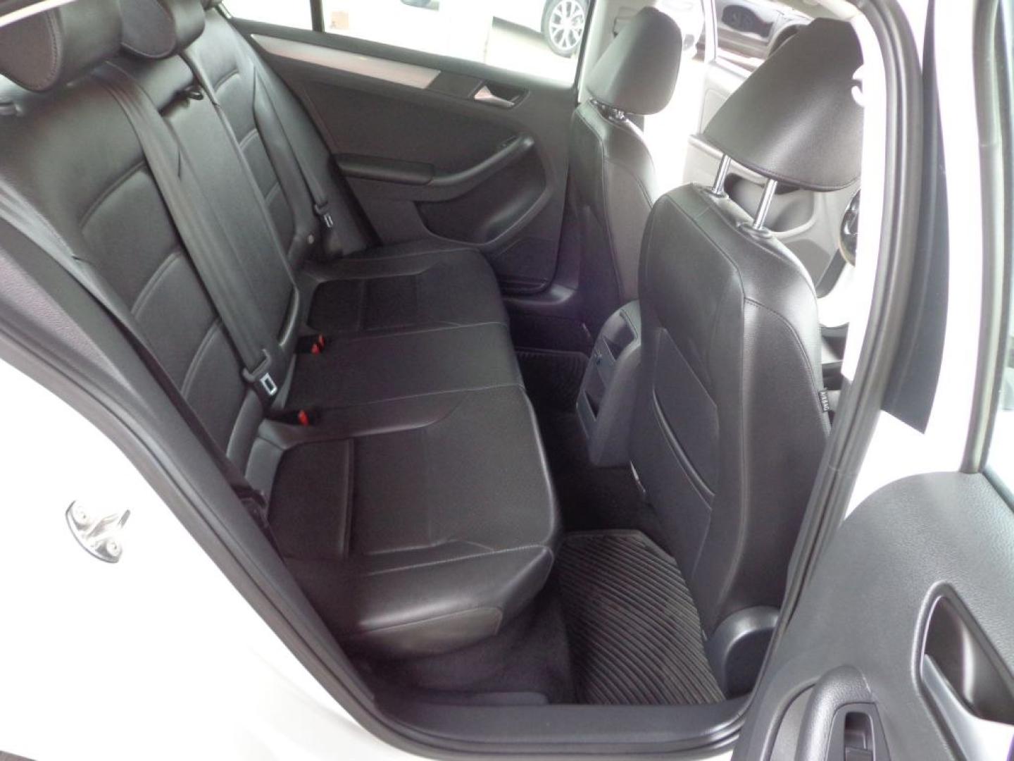 2017 WHITE VOLKSWAGEN JETTA SE (3VWDB7AJ2HM) with an 1.4L engine, Automatic transmission, located at 6610 L St., Omaha, NE, 68117, (402) 731-7800, 41.212872, -96.014702 - THIS VEHICLE HAS A BEEN FULLY INSPECTED AND HAS A CLEAN TITLE WITH A FREE CARFAX REPORT PROVIDED! 2-OWNER, CLEAN CARFAX, LOW MILEAGE, HEATED LEATHER, SUROOF AND NEWER TIRES! *****We have found that most customers do the majority of their shopping online before visiting a ealership. For this rea- Photo#15