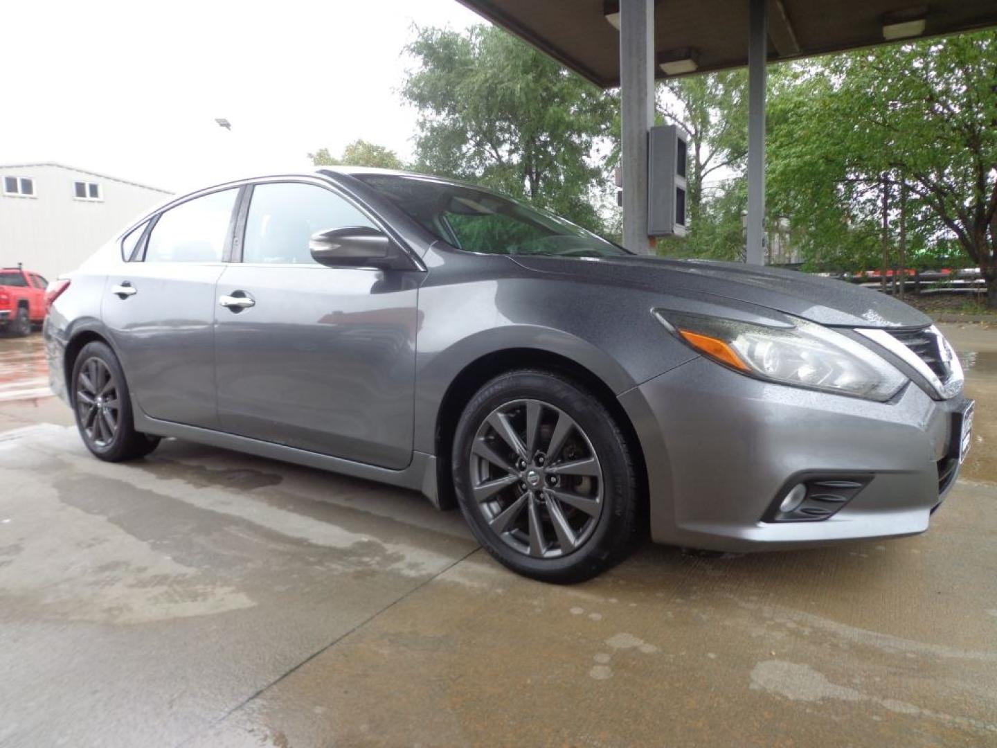 2017 GRAY NISSAN ALTIMA 2.5 (1N4AL3AP7HC) with an 2.5L engine, Continuously Variable transmission, located at 6610 L St., Omaha, NE, 68117, (402) 731-7800, 41.212872, -96.014702 - THIS VEHICLE HAS A BEEN FULLY INSPECTED AND HAS A CLEAN TITLE WITH A FREE CARFAX REPORT PROVIDED! 2-OWNER, CLEAN CARFAX, LOW MILEAGE, SUNROOF, HEATED LEATHER, NAV AND NEWER TIRES! *****We have found that most customers do the majority of their shopping online before visiting a ealership. For th- Photo#2