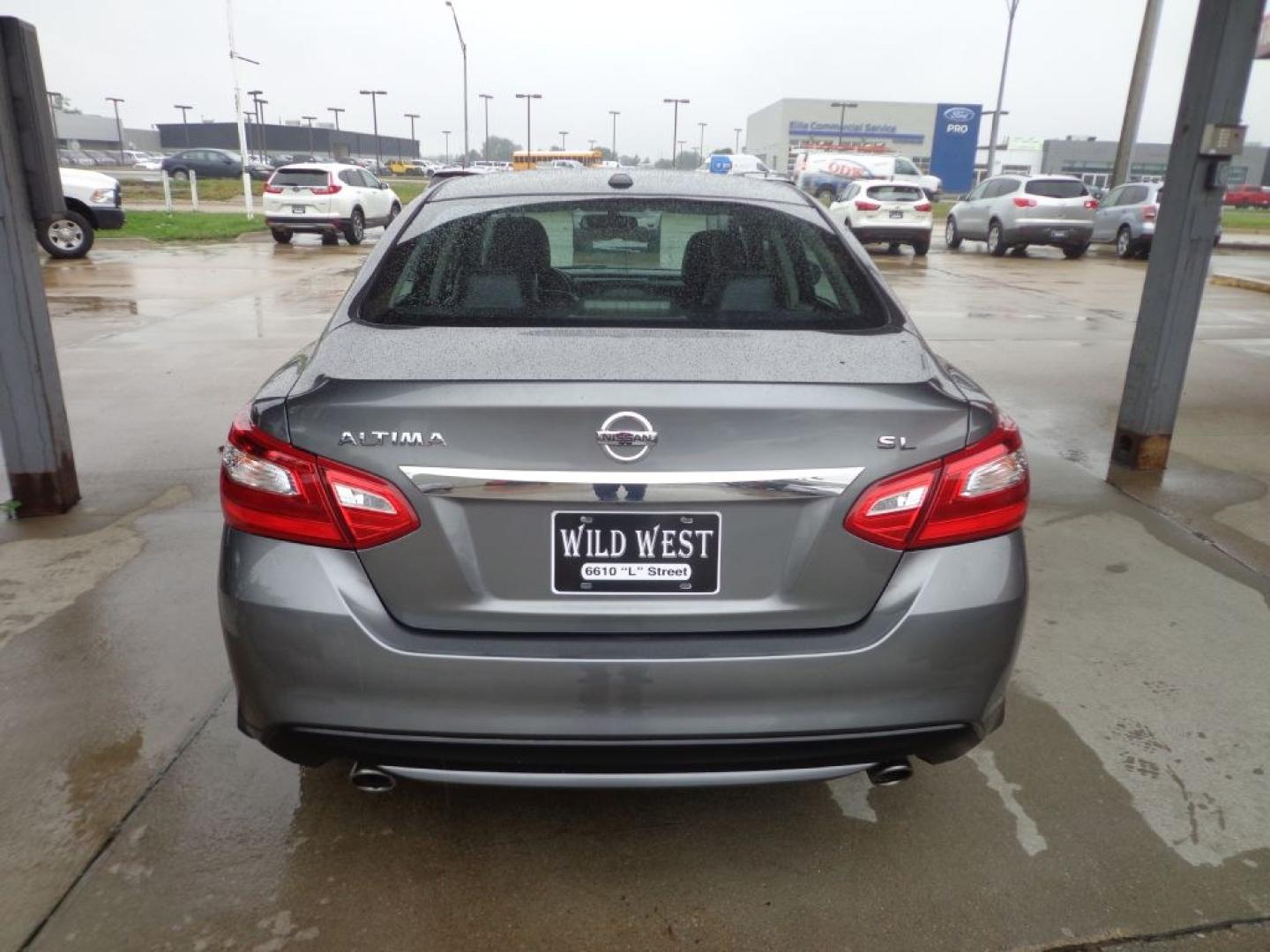 2017 GRAY NISSAN ALTIMA 2.5 (1N4AL3AP7HC) with an 2.5L engine, Continuously Variable transmission, located at 6610 L St., Omaha, NE, 68117, (402) 731-7800, 41.212872, -96.014702 - THIS VEHICLE HAS A BEEN FULLY INSPECTED AND HAS A CLEAN TITLE WITH A FREE CARFAX REPORT PROVIDED! 2-OWNER, CLEAN CARFAX, LOW MILEAGE, SUNROOF, HEATED LEATHER, NAV AND NEWER TIRES! *****We have found that most customers do the majority of their shopping online before visiting a ealership. For th- Photo#4